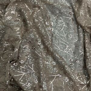 Sequin and brown material